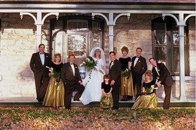 The couple with the bridesmaids and groomsmen