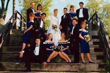 The couple with the bridesmaids and groomsmen