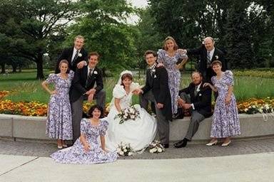 The couple with the bridesmaids and groomsmen