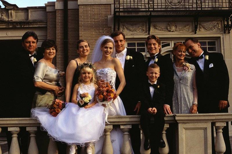 The couple with the bridesmaids and groomsmen