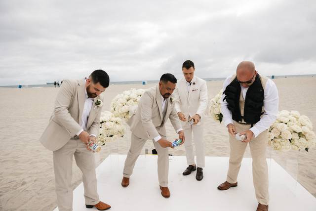 Groomsmen with beer boy