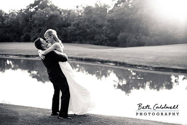 Carrying his bride by the pond