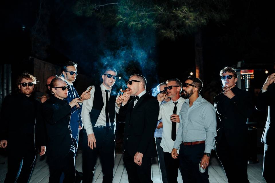 Groomsmen with cigars