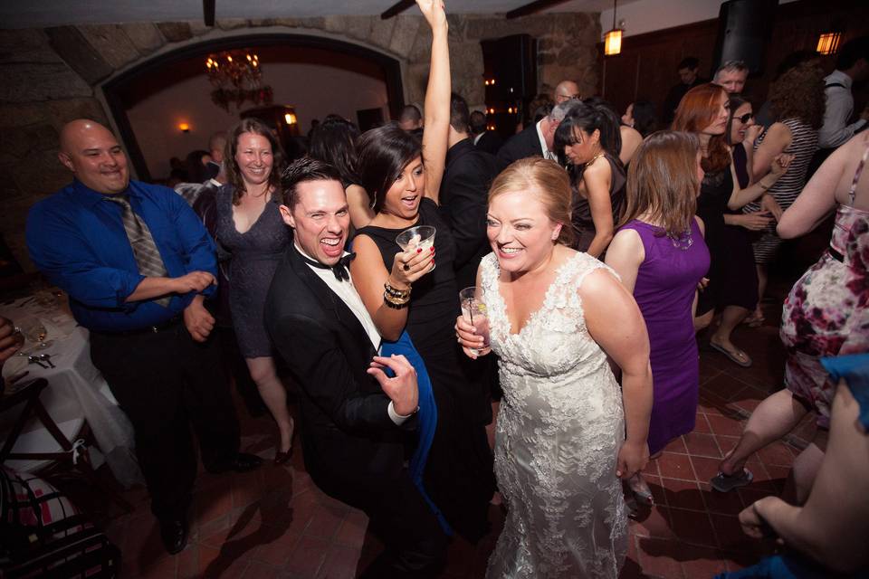 Newlyweds and their guests on the dance floor