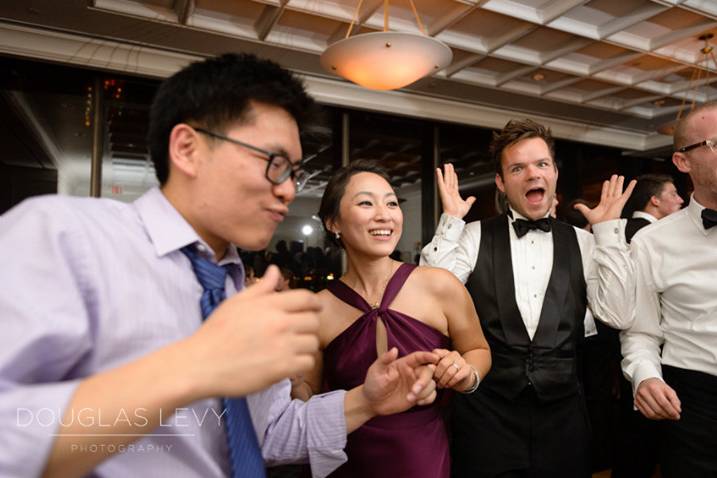 Newlyweds and their guests on the dance floor