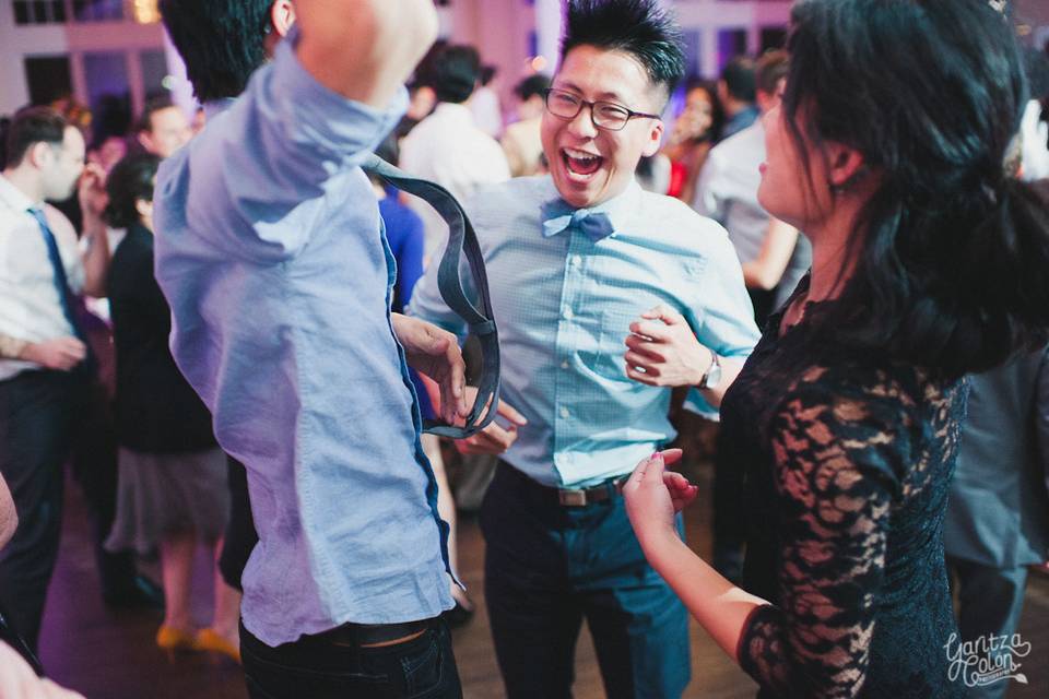 Newlyweds dancing with each other