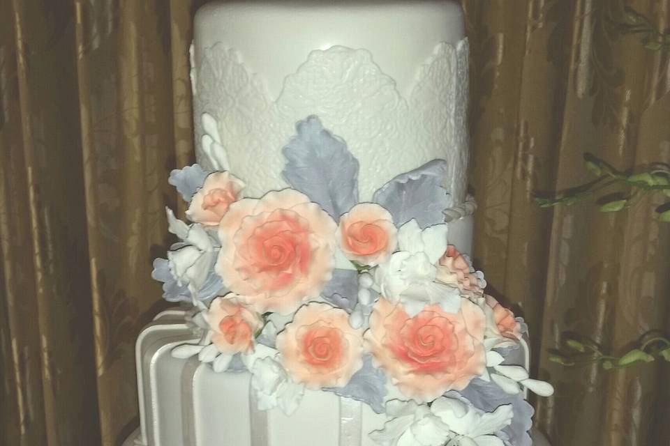 Wedding cake with peach flowers