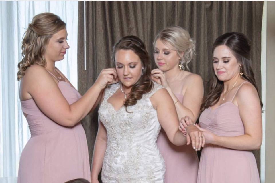 Assisting the bride