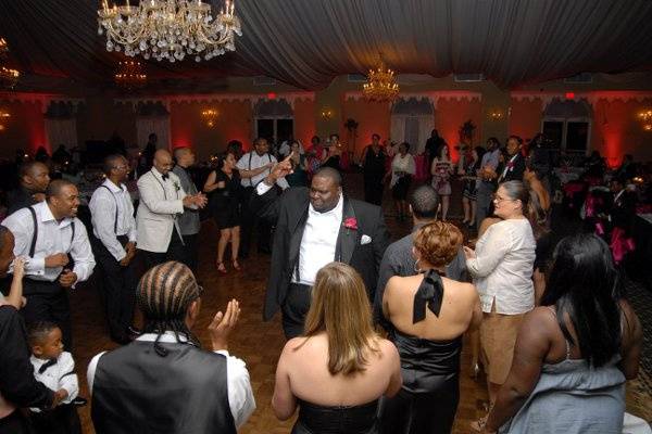 This is a GREAT shot of the bridal party dancing to the sounds of a Untouchable Entertainment Group (UEG) DJ.