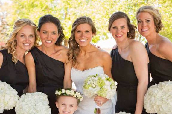 Bride, bridesmaids, and flower girl