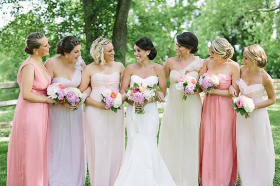 Bride and her bridesmaids with their bouquets