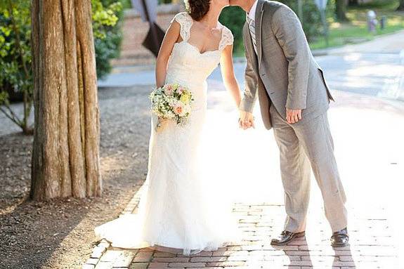 Bride kissing her groom