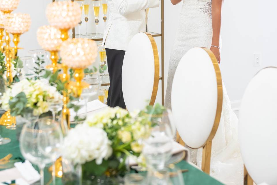White velvet and gold chairs