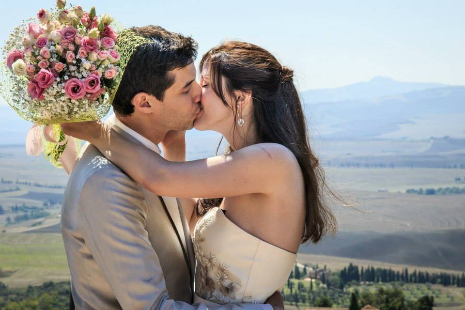 Newlyweds kissing