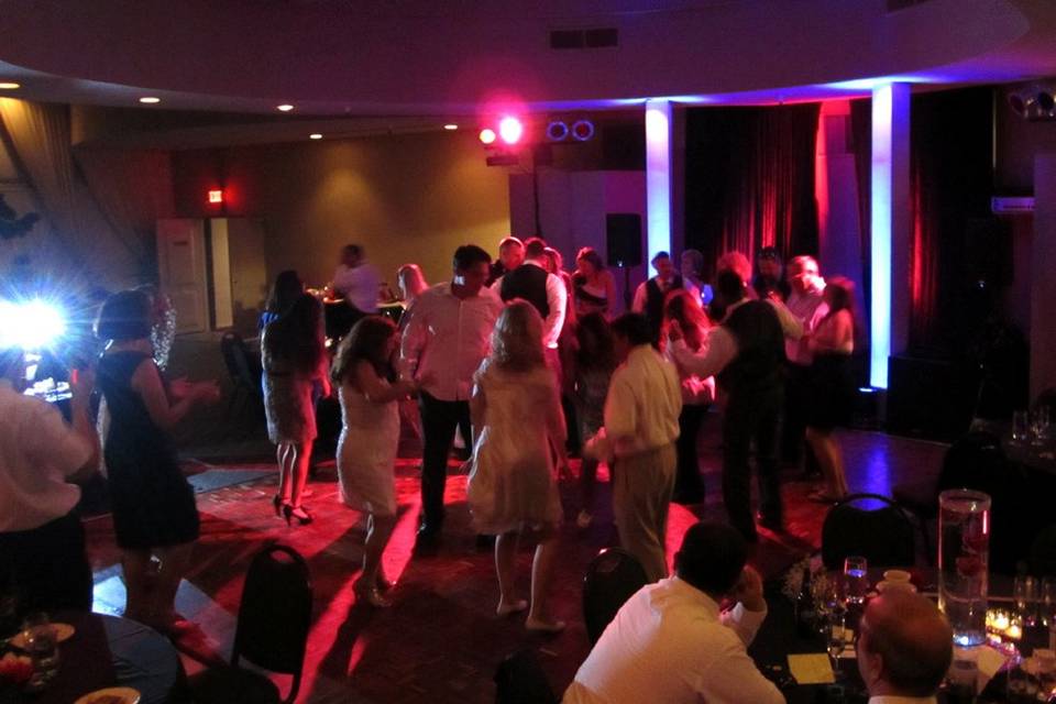 A shot of the dance floor from a wedding we performed at, from Skyline Country Club. No cheesy lasers or little green dots. Just warm, inviting, and photo-friendly lighting.