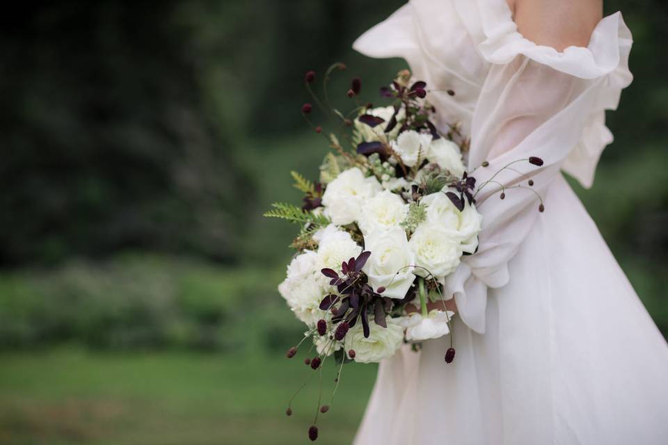 Elegant dress and bouquet, Garner Wedding Venue