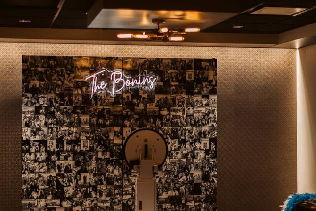 Photo booth with custom neon · Photo: L. Rae Creative