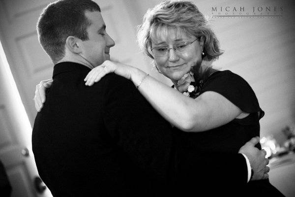 Groom dances with mother