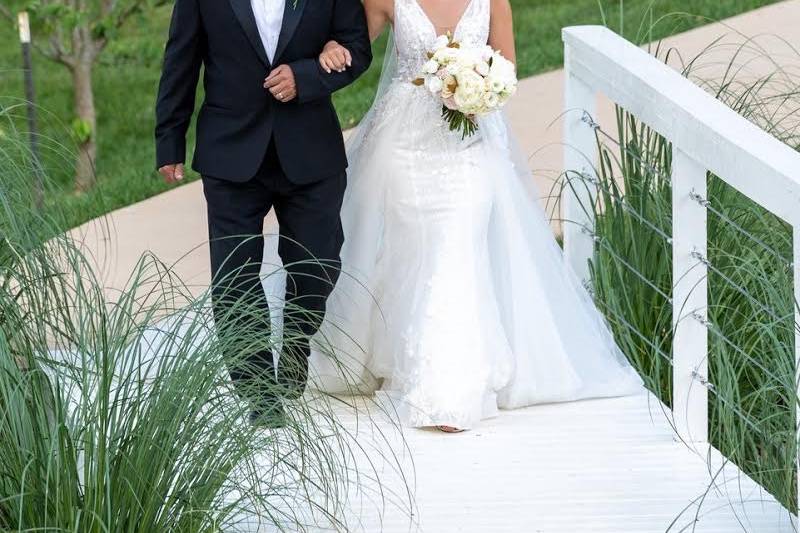 Bride entrance over waterfall