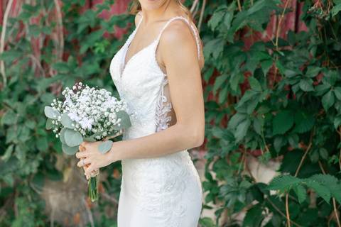 Admiring her beautiful dress