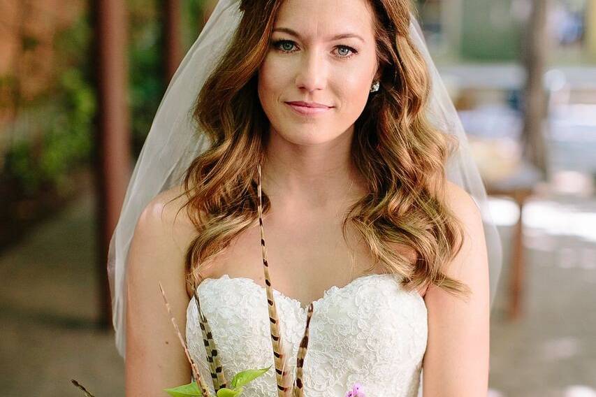 Bride holding her wedding flowers