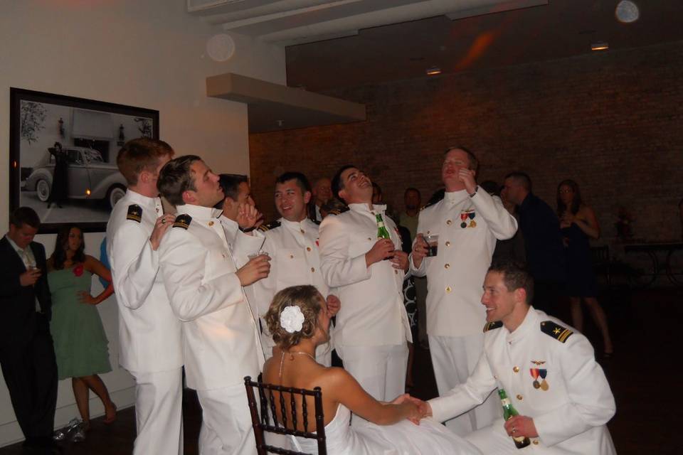 Groomsmen singing you've lost that loving feeling at 511 s. Palafox