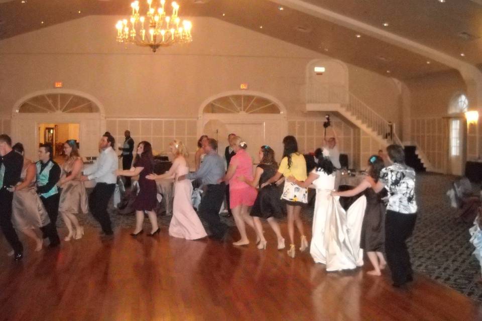 Train at wedding reception in the ballroom at mustin beach officer's club