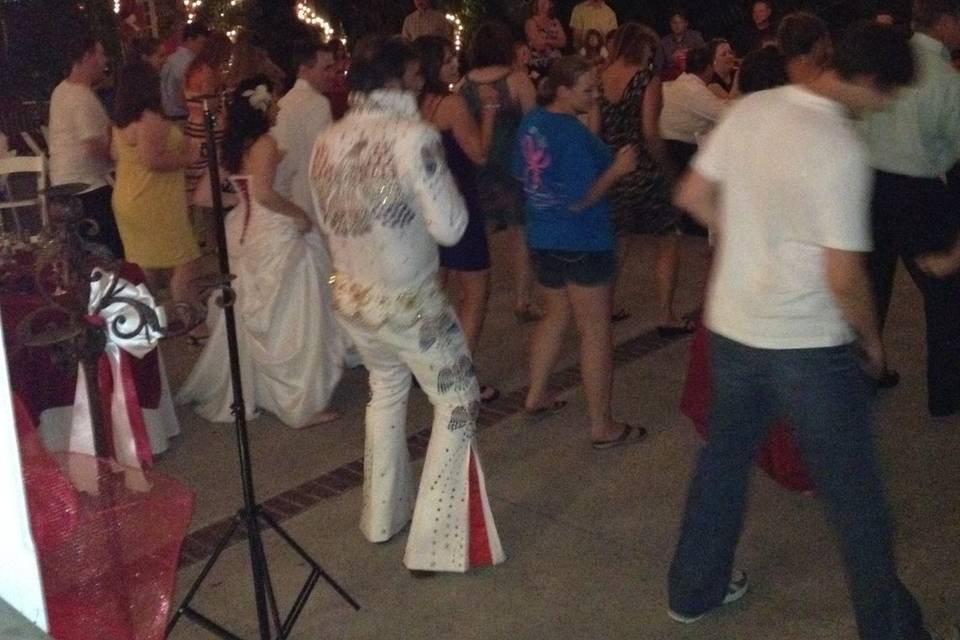 Elvis doing the electric slide with guests at lee house