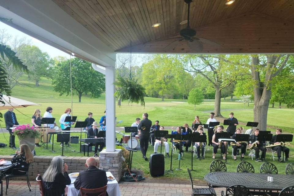 Outdoor reception with orchestra