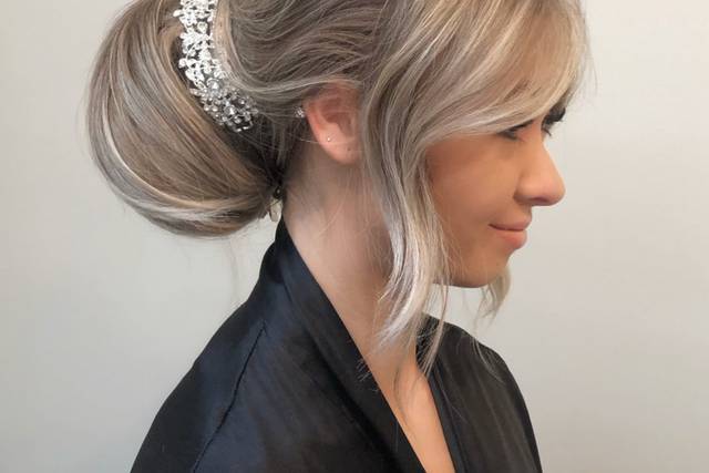 Elegant updo with embellished headpiece