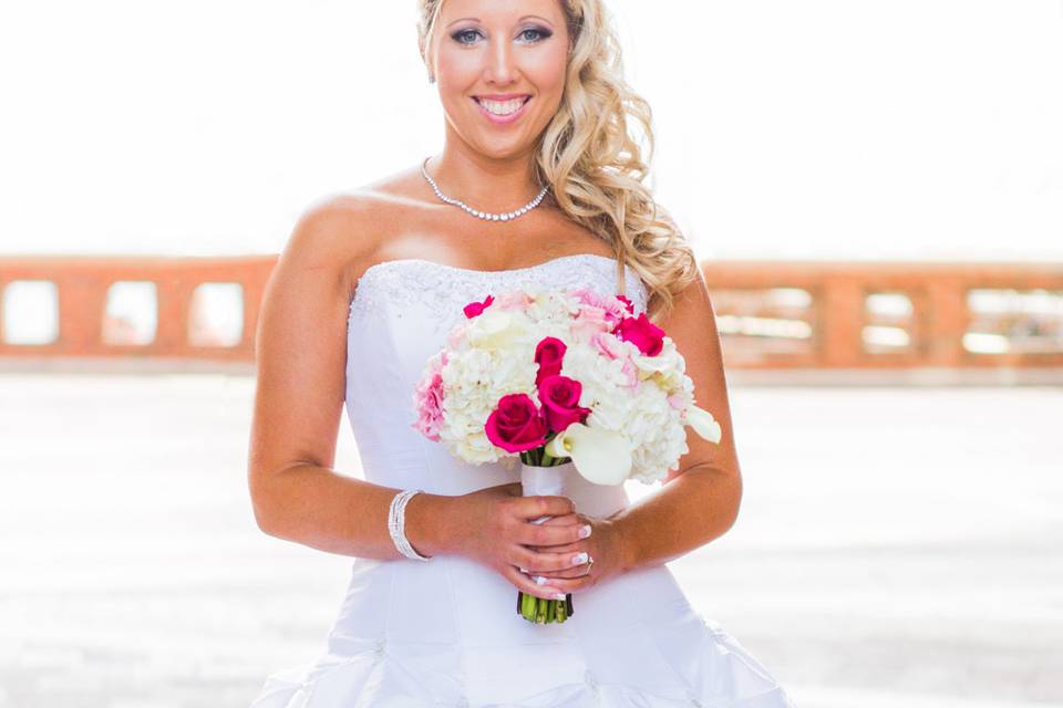 Beautiful bride under the dome at the Boston Harbor Hotel, getting ready to board the Odyssey for her wedding.