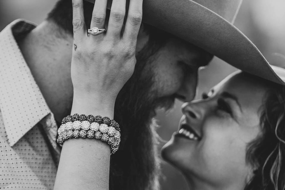 Put that ring hand on his hat!