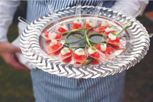 Garlic scapes accentuate scallop ceviche with curried watermelon. Farm to table. Sea to table.