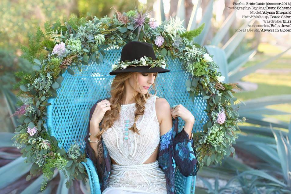 Flower crown around bride's hat