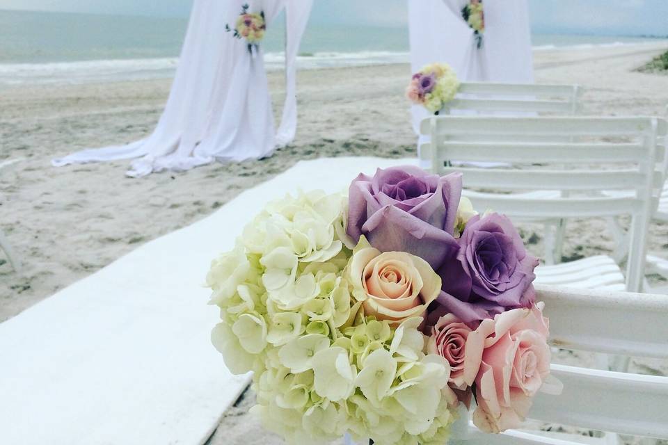Flowers at beach wedding