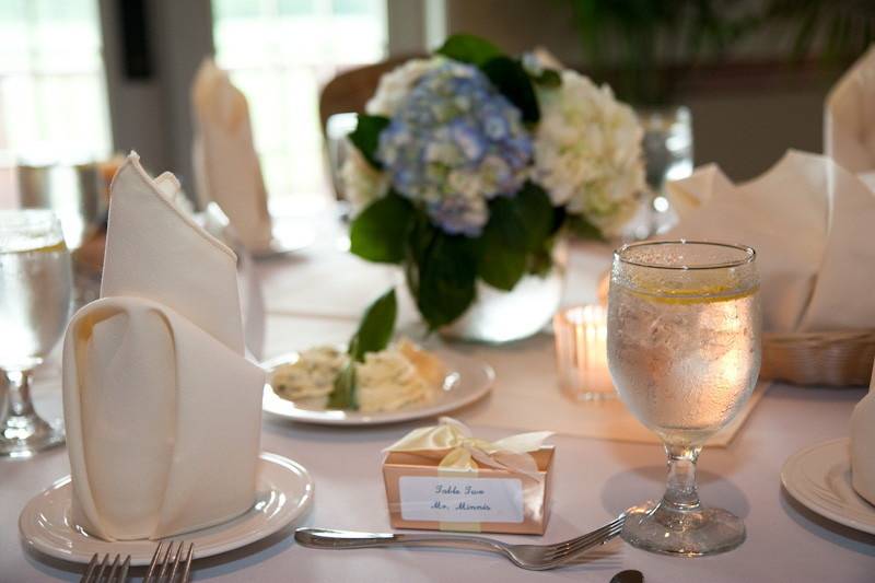 White table setup with centerpiece