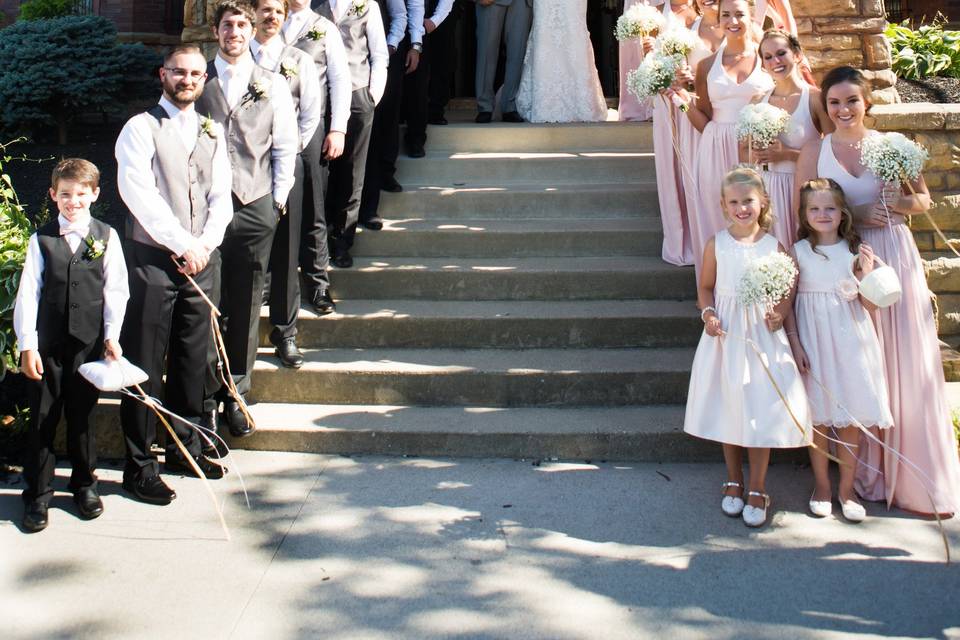 Newlyweds and their wedding party