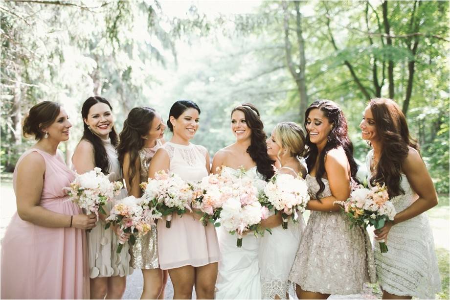 Bride and bridesmaids in the woods