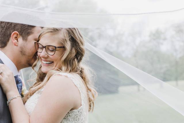 Bride and Groom under veil