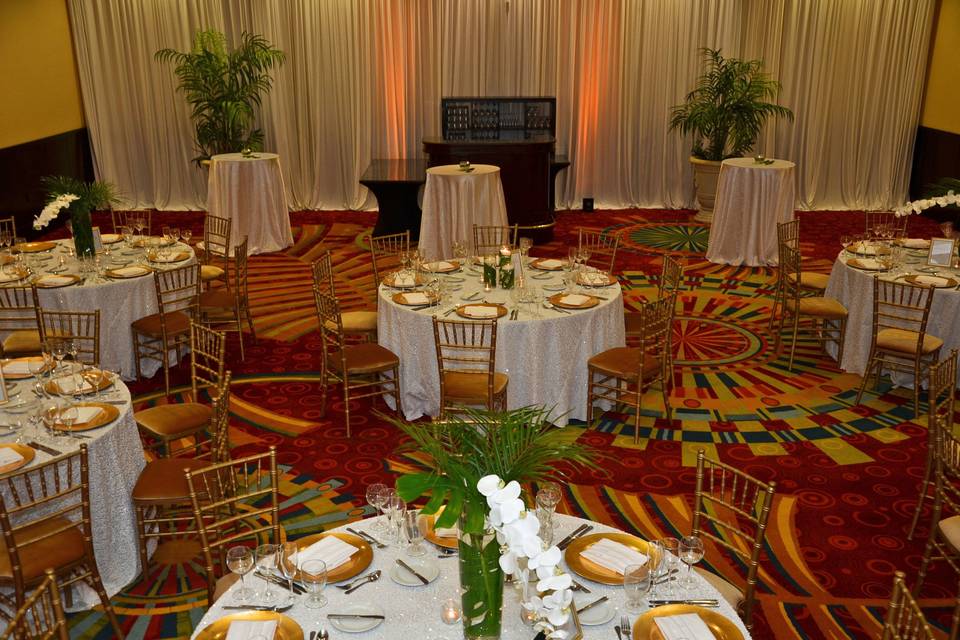 Reception space linens/chairs: kate ryan linensdecor: tas eventsphotography: boone's professional events cake: corey's bakerydrapery: cheers! Events
