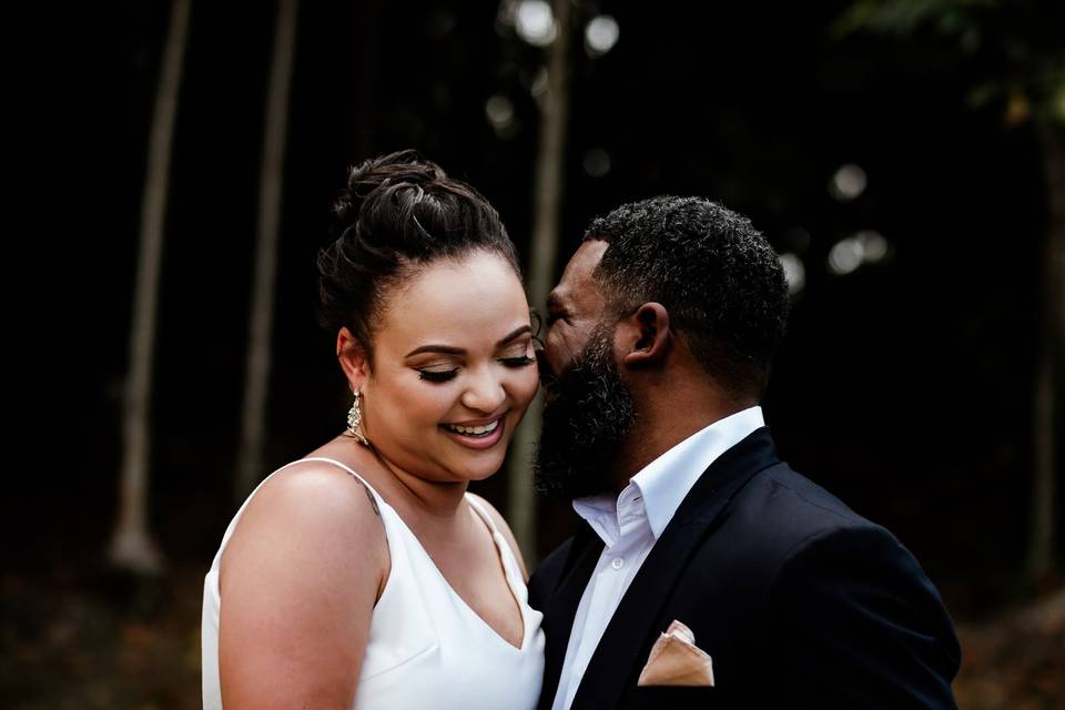 Groom kissing the bride