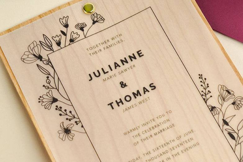 A layer of vellum paper + a later of real wood paper for the perfect mix of rustic and elegant.