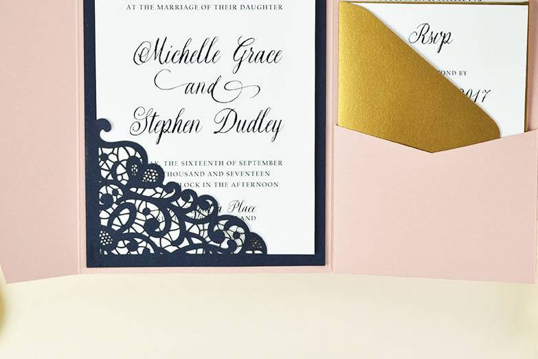 Elegant DIY pocket invitation made easy and budget friendly with Lace laser cut slide-in card in Imperial Blue, blush pocket in Cipria, and Antique Gold accents.
