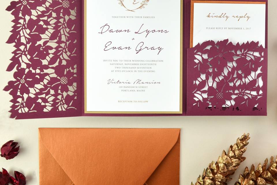 Leaves laser cut pocket in Burgundy paired with Copper envelope for a wedding invitation suite that's perfect for fall.