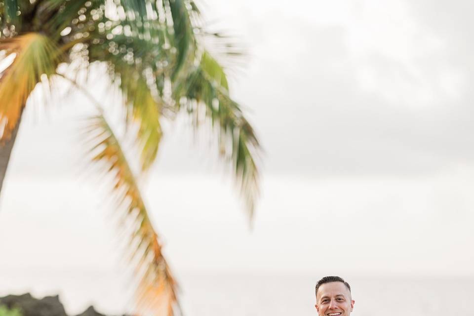 Groom in tux with bride