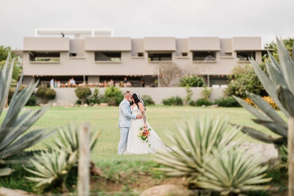 Couple in front of villa