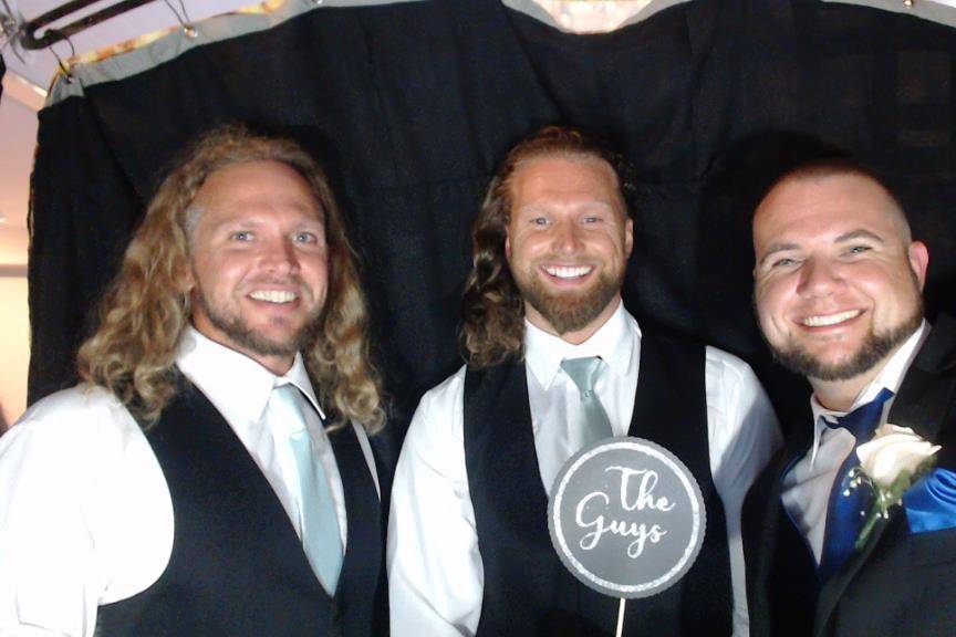 Groomsmen In Photo Booth