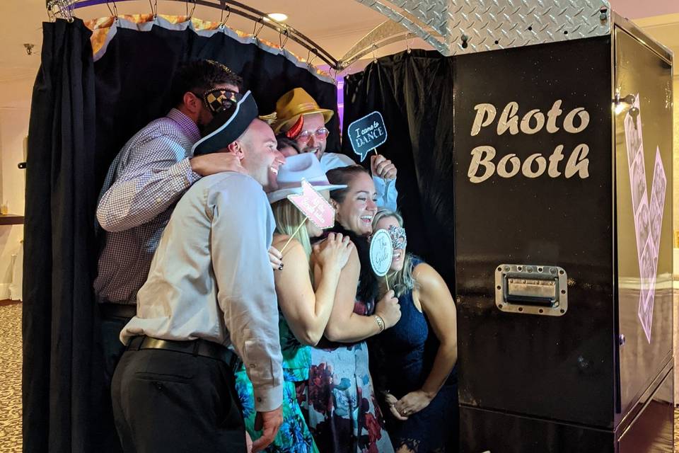 Guests Taking Photos In Booth