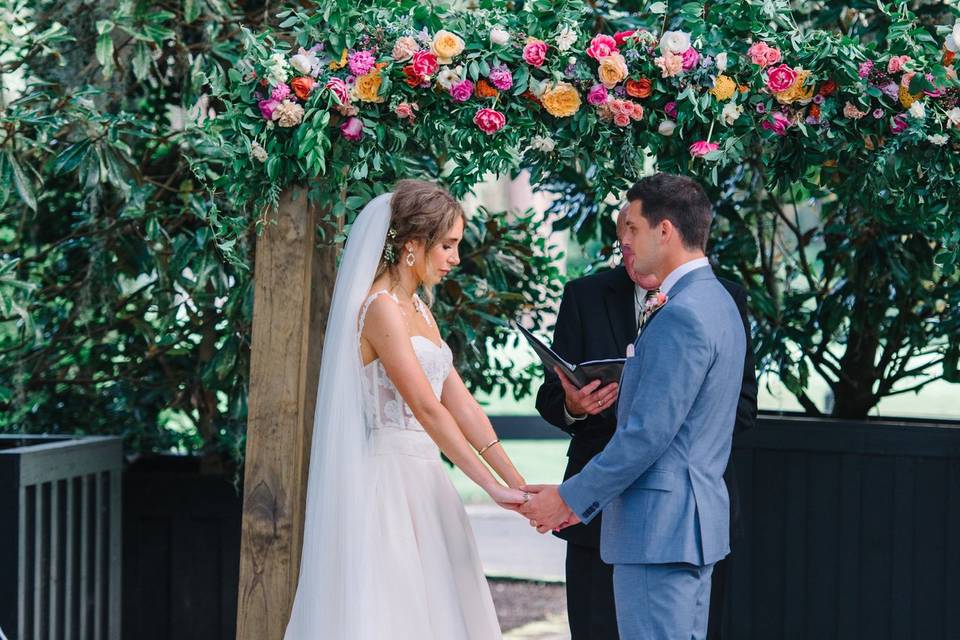 Floral arch at altar