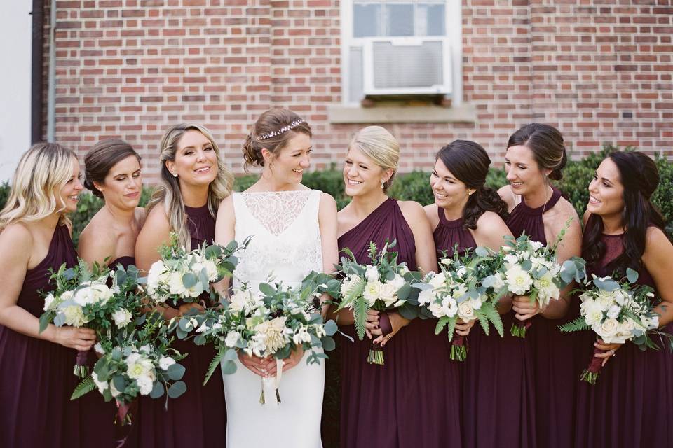 Bridesmaids wearing violet